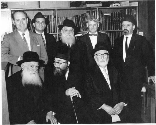 Parlor meeting on behalf of Ponivezh Yeshiva at my home in Miami Beach. Seated, right to left: Rabbis Leizer Levin, Y. Gruenwald, and Yosef Shlomo Kahaneman;  standing, right to left: R. C. Rosenzweig, Mr. Leo Pappaport, R. Mordechai Shulman, me, and Mr.. Maurice Goldring