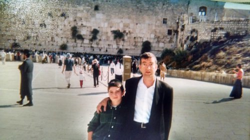The author, celebrating his bar mitzvah with his father at the Kotel.