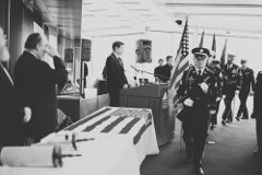  The color guard marches during an Oct. 12 dedication of a Torah scroll for the U.S. military at the Museum of Jewish Heritage in Manhattan. At the podium is Jacob Kamaras, and at left giving a salute is his father, Philip Kamaras. Credit: Alexa Drew Photography.