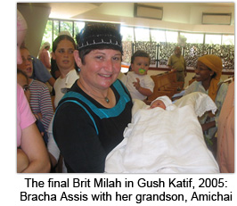 The final Brit Milah in Gush Katif, 2005: Bracha Assis with her grandson, Amichai
