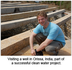 Visiting a well in Orissa, India, part of a successful clean water project